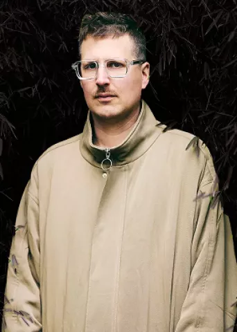 Portrait photo of guest speaker Maarten Inghels at Springbok's Time To Make Sense 2025 Summit at the Verbeken Foundation contemporary art museum. The visual states that he is an author and visual artist.