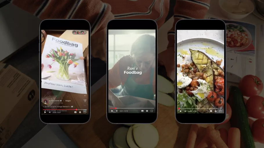 Image showing Foodbag’s campaign concept on smartphones with family dining scenes.
